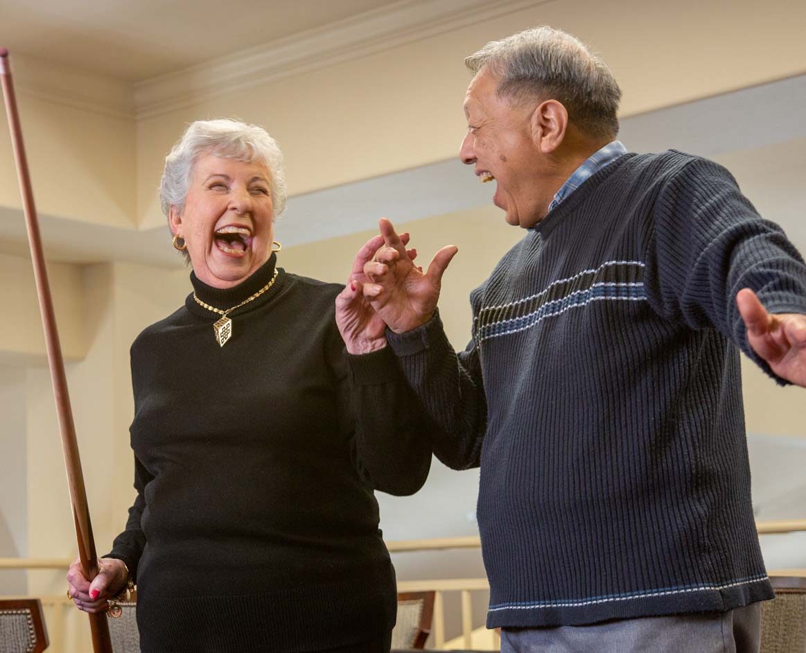 Independent seniors in Hopkinton playing pool