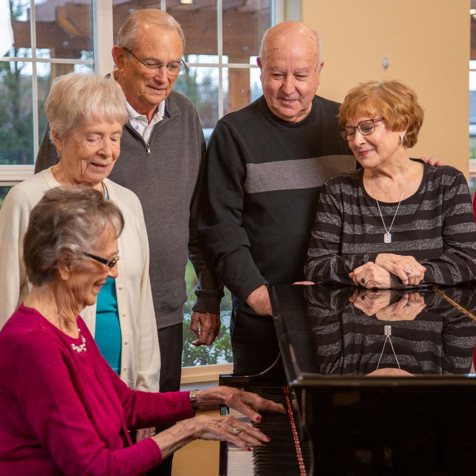 Fairview Estates seniors playing piano