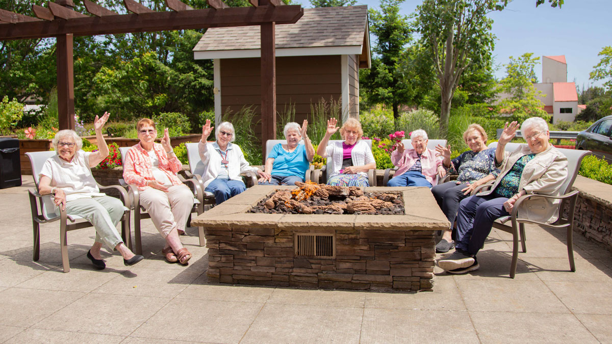 Fairview Estates residents by firepit