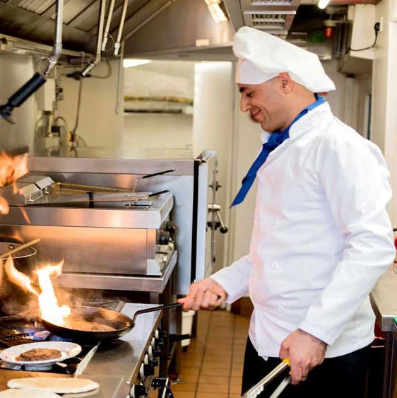 Fairview Estates chef-cooking-meal-in-kitchen